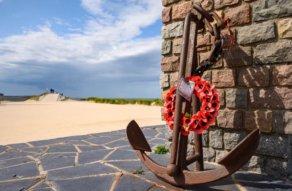 Close up of the anchor with poppies at the end of The Operation Dynamo Memorial to Allied Forces in Dunkirk, France