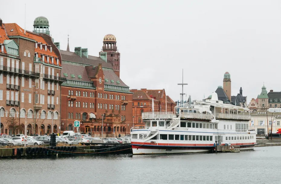 Channel of old city with docked touristic ship