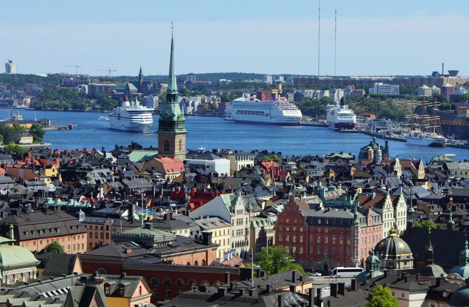 Aerial view of the city and the conventional and cruise ships docked in Stockholm, Sweden