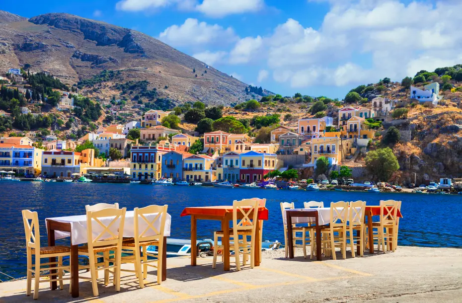 Tavern tables by the sea at Symi