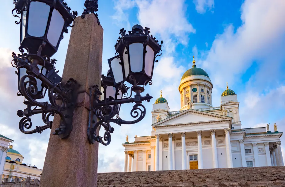 A lantern on Senate square in Helsinki and the Cathedral Of St Nicholas in the background